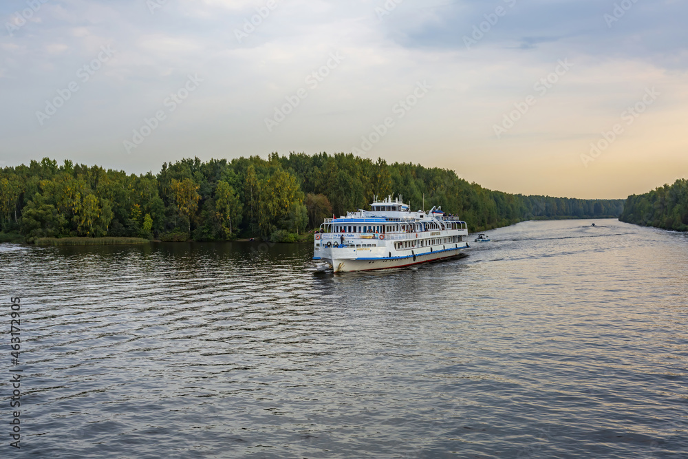 White double-deck ship Bashkortostan on a cruise on the Volga River. Built in Hungary in 1962. Yaroslavl Region, Russia White double-deck ship Bashkortostan on a cruise on the Volga River. Built in Hungary in 1962. Yaroslavl Region, Russia