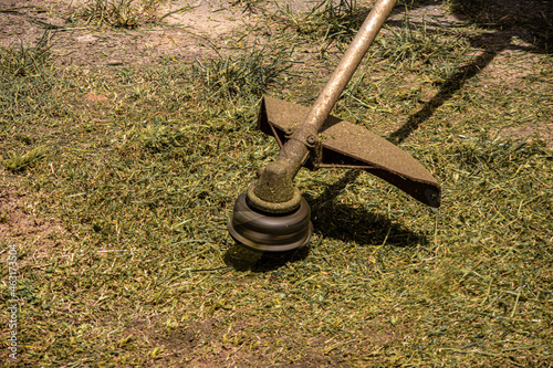 garden hose on a grass photo