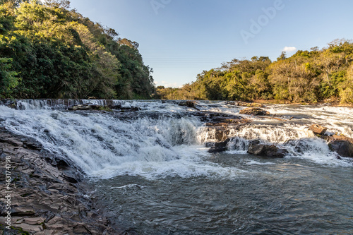 Capela do Rosario dam with Cadeia river and forest photo