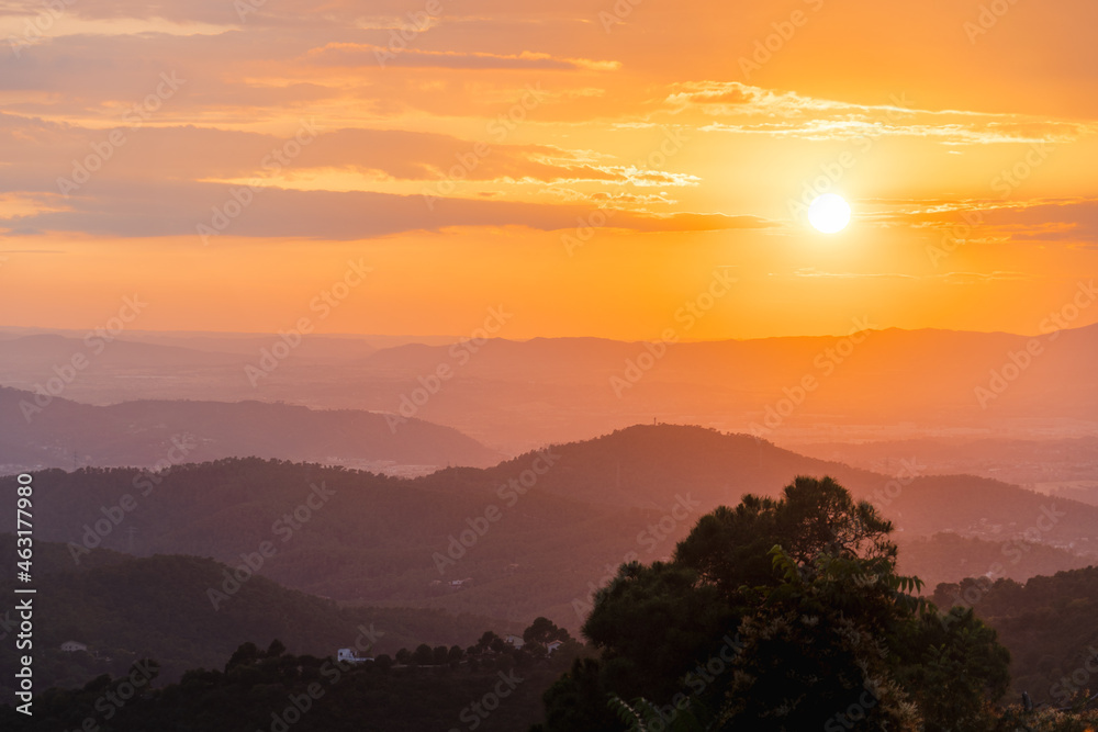 shining sun over the mountains