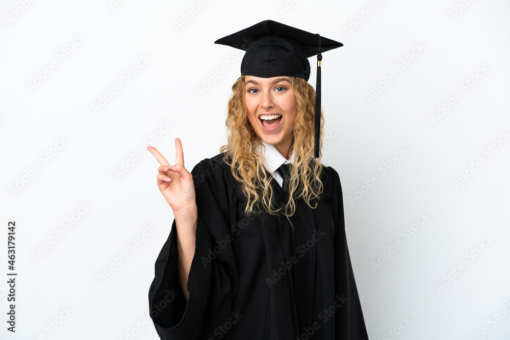 Young university graduate isolated on white background smiling and showing victory sign Young university graduate isolated on white background smiling and showing victory sign