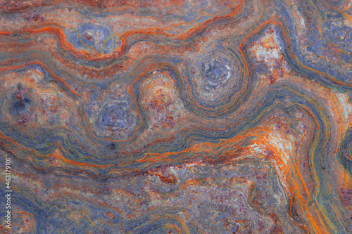 grunge background: curly rust on an old metal surface, toning