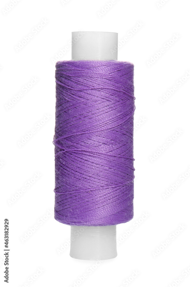 Spool of violet sewing thread isolated on white Spool of violet sewing thread isolated on white