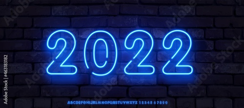 Happy new year 2022 in neon style. 2022 bright gradient. Long brick wall banner. Vector template for web header