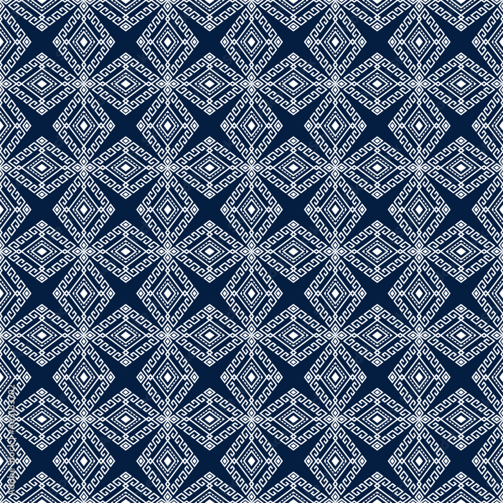 White Tribal or Native Seamless Pattern on Blue Background in Symmetry Rhombus Geometric Bohemian Style for Clothing or Apparel,Embroidery,Fabric,Package Design