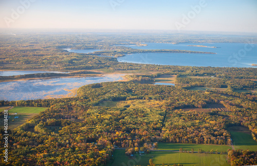 Fototapeta Naklejka Na Ścianę i Meble -  Aerial view of fields and trees in autumn color and lakes near Brainerd Minnesota