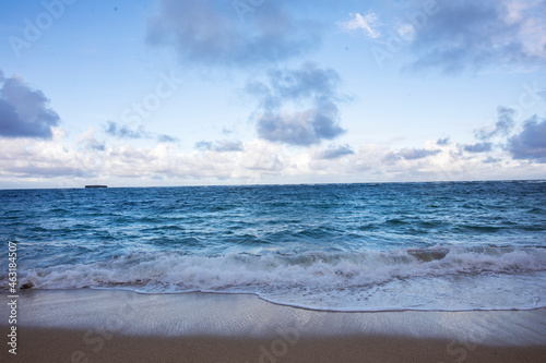 ocean waves on a sandy beach