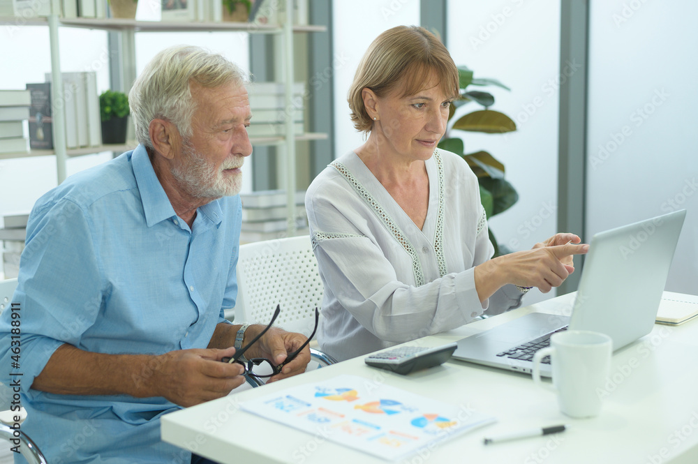 Caucasian senior people holding credit card, shopping online concept