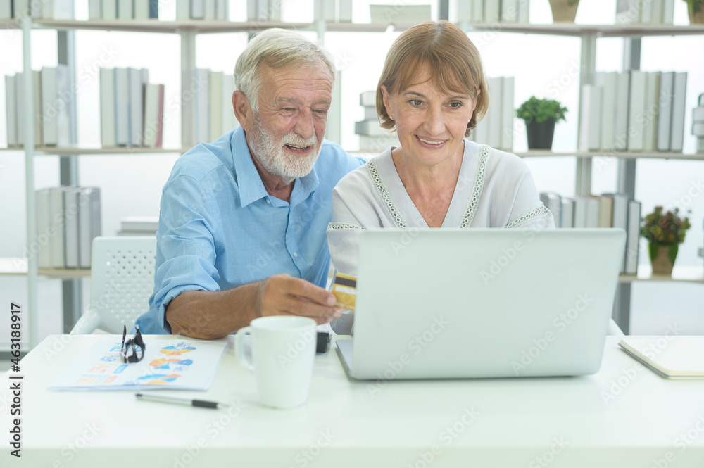 Caucasian senior people holding credit card, shopping online concept Caucasian senior people holding credit card, shopping online concept