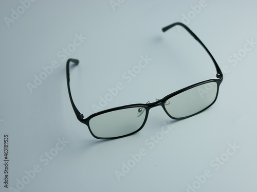 Black sunglasses with clear glass isolated on white background. anti radiation health glasses photo