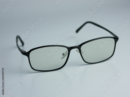 Black sunglasses with clear glass isolated on white background. anti radiation health glasses