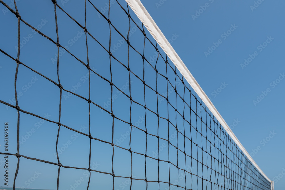 Beach volleyball court with an ocean background. Summer sport concept Beach volleyball court with an ocean background. Summer sport concept