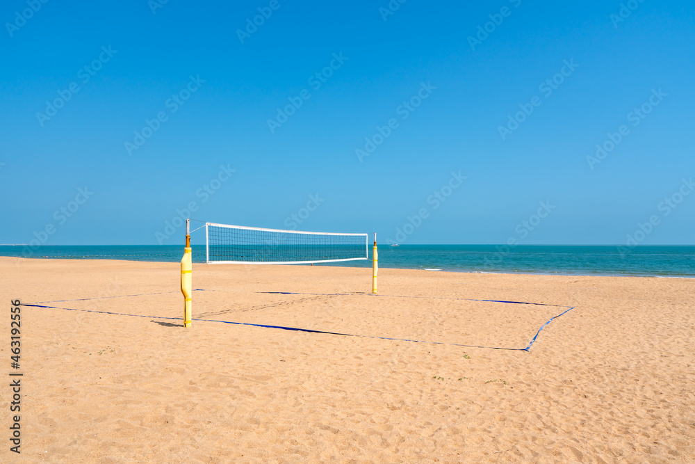 Beach volleyball court with an ocean background. Summer sport concept Beach volleyball court with an ocean background. Summer sport concept