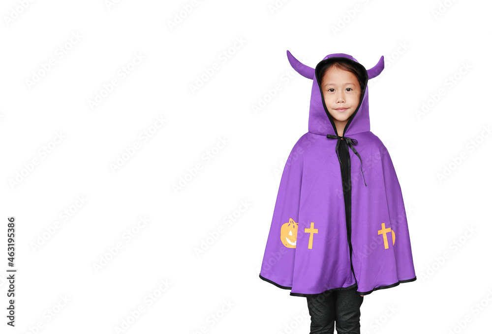 Little girl dressed Halloween costume. Kid in Dracula coat isolated over white background with copy space.