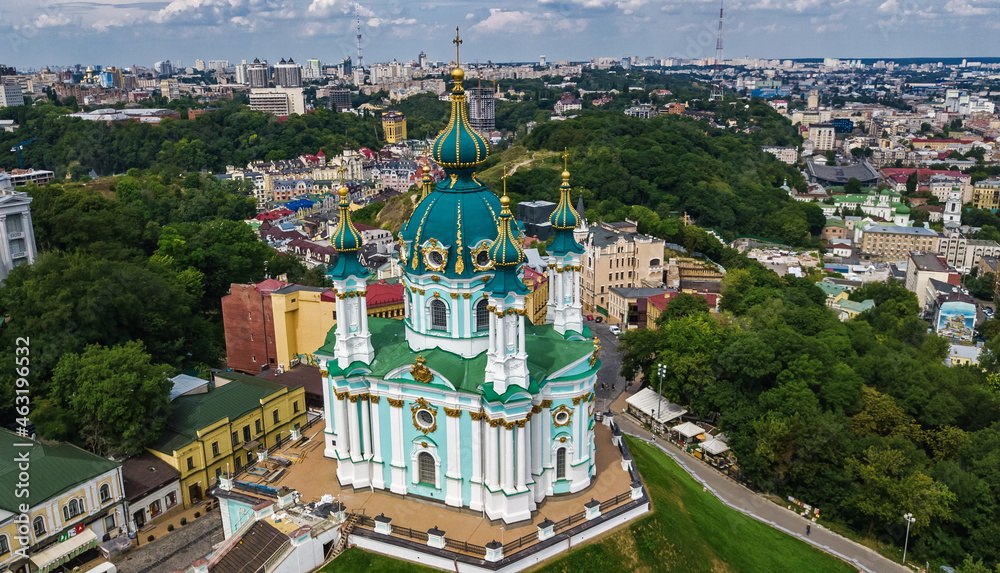 Aerial drone view of Saint Andrew's church and Andreevska street from above, cityscape of Podol district, city of Kiev (Kyiv), Ukraine

