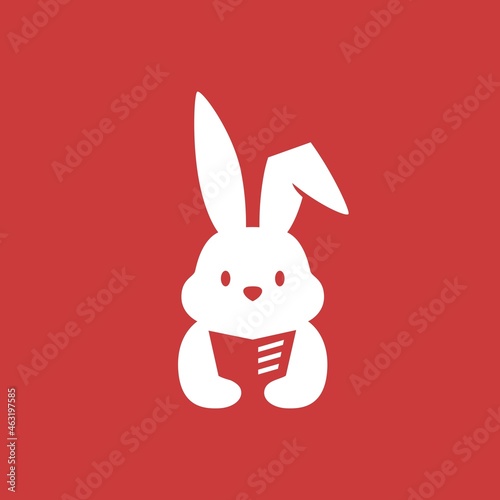 rabbit bunny hare book read newspaper negative space logo vector icon illustration