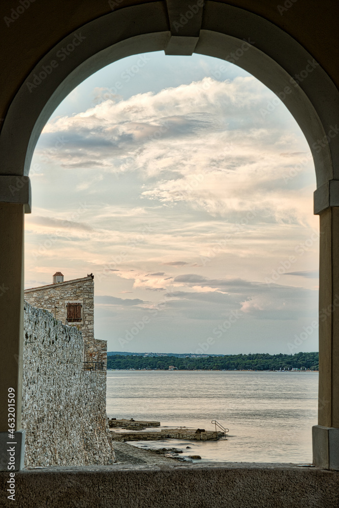 View trough arcades of city wall in Novigrad