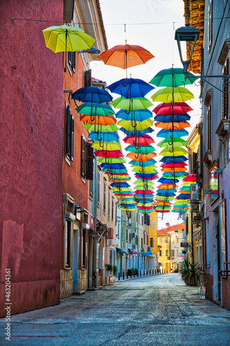 Street in Novigrad decorated with umbrellas