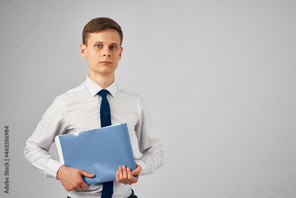 manager in a shirt with a tie documents professional work manager in a shirt with a tie documents professional work