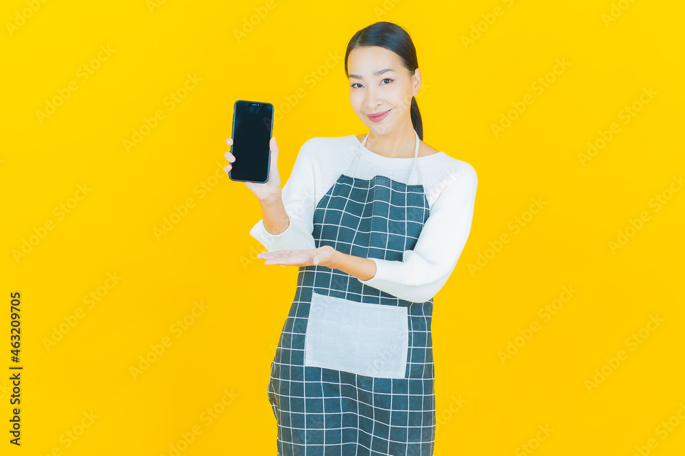 Portrait beautiful young asian woman smile with smart mobile phone Portrait beautiful young asian woman smile with smart mobile phone