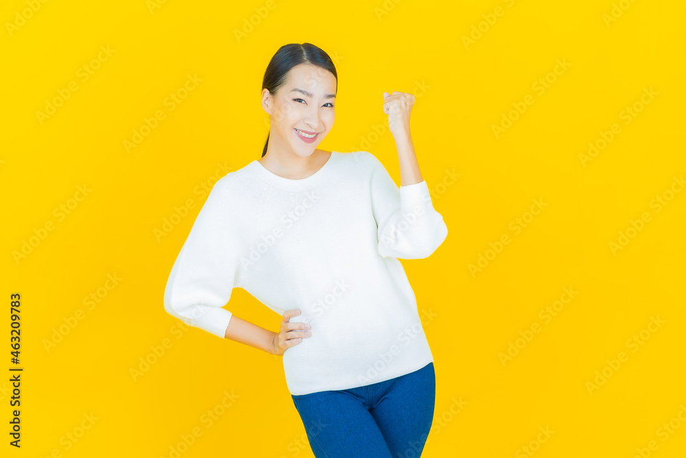 Portrait beautiful young asian woman smile with action Portrait beautiful young asian woman smile with action