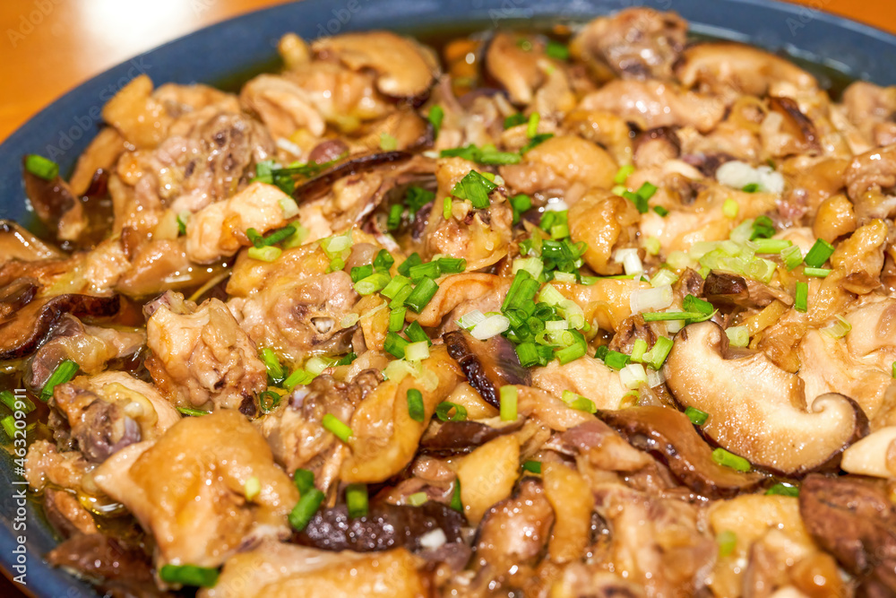 A delicious steamed chicken with shiitake mushrooms A delicious steamed chicken with shiitake mushrooms