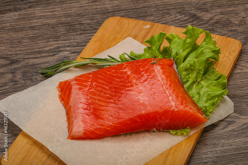 Salmon piece steak served rosemary