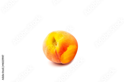 Bitten peach or nectarine on white background. Delicious juicy fresh fruit