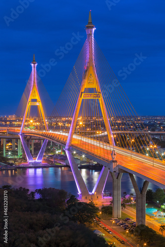 Aerial view of Bhumibol Bridge and Chao Phraya River in structure architecture concept, Urban city, Bangkok. Downtown area at night, Thailand 