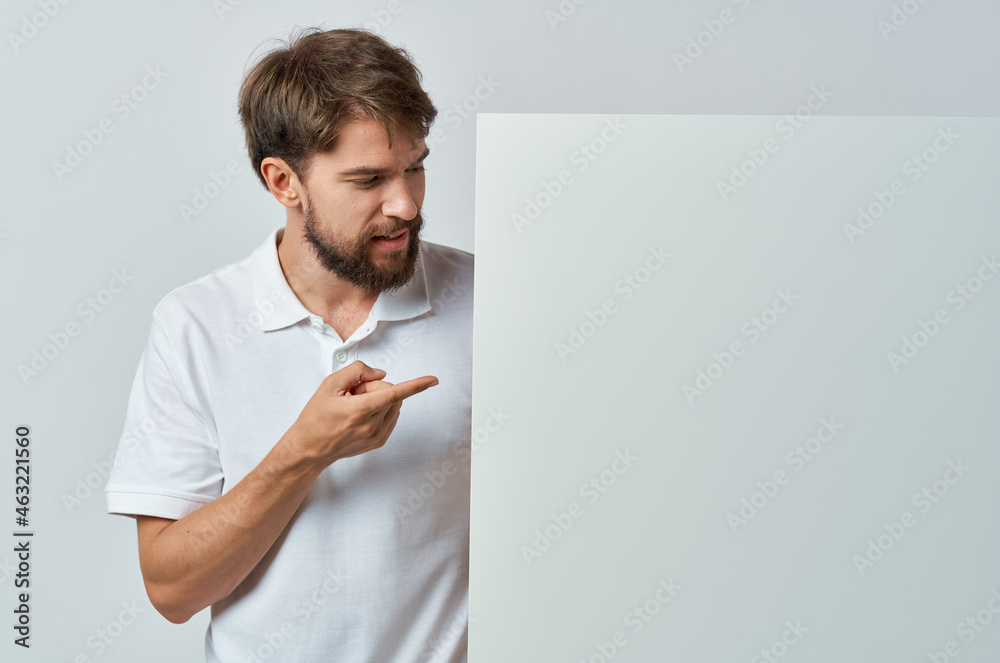 emotional man white banner in hand blank sheet presentation isolated background emotional man white banner in hand blank sheet presentation isolated background