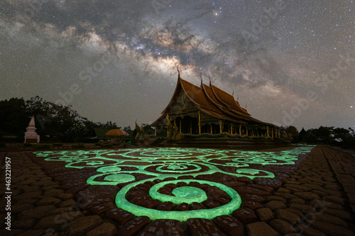 milky way with bright stars on blue sky at night at Wat Sirindhornwararam, Thailand. Natural universe space landscape background. It is the galaxy. Astronomy landscape. photo