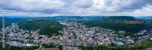 Aerial view around the city Merzig on a cloudy day in summer