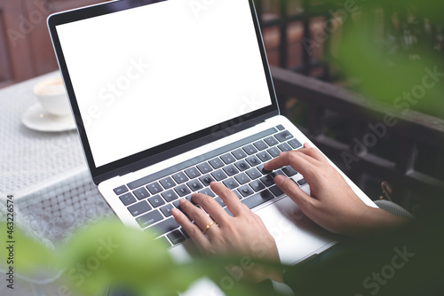 Casual business woman worker online working via laptop, surfing the internet at coffee shop, telecommuting, freelancer lifestyle, mockup