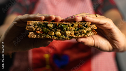 sandwich is famous all around the globe. it is basically made from bread, veggies, cheese, spices, or chutneys. © Maitri