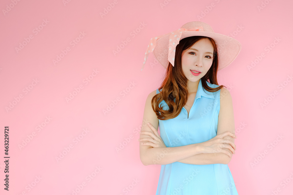 Portrait beautiful asian woman on pink background, emotions action, summer life concept Portrait beautiful asian woman on pink background, emotions action, summer life concept