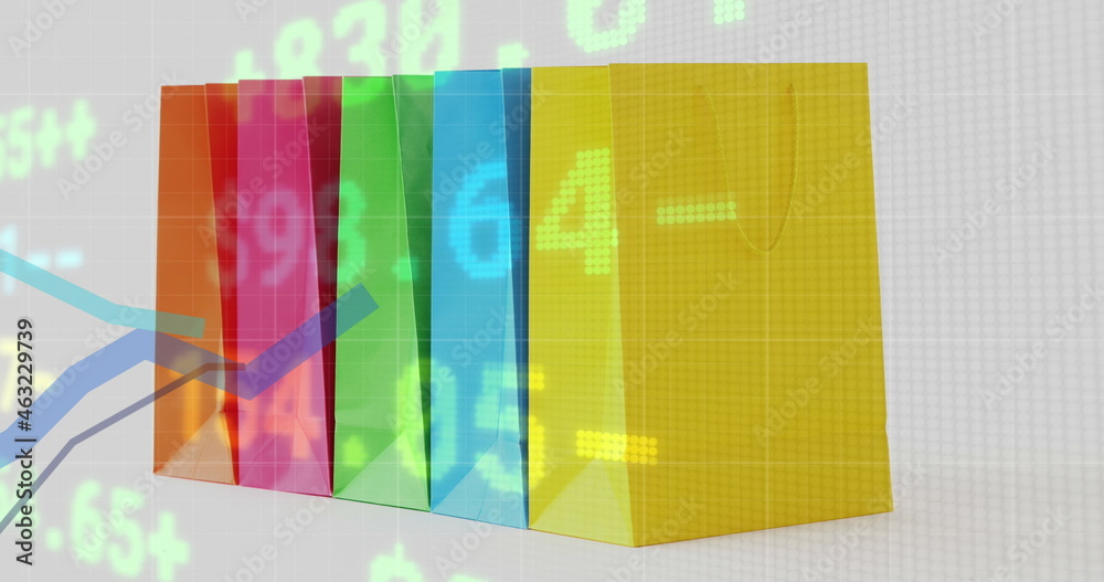 Image of numbers changing, blue line and financial data processing over row of colourful shoppin Image of numbers changing, blue line and financial data processing over row of colourful shoppin