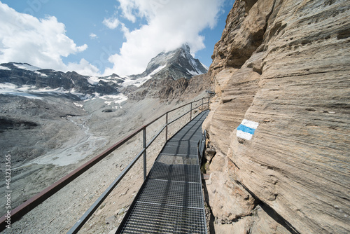 view on the alpine hiking trail to the “Hörnlihütte” hoernli cottage, near zermatt in switzerland, the hut is at the foot of the matterhorn.
