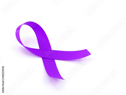purple ribbon isolated on white background, symbol of domestic violence awareness, world alzheimer or epilepsy day, close-up with copy space photo