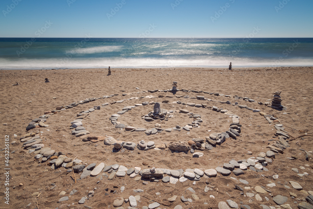 Stones forming concentric circles on the beach of Macenas, Mojacar, Almería.