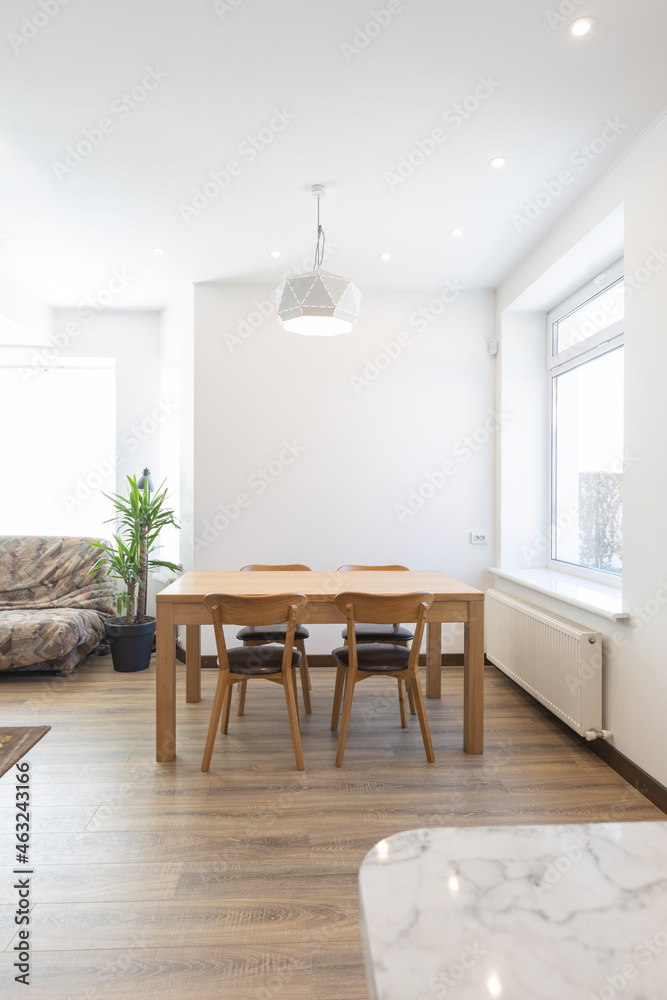 Fototapeta premium Kitchen modern wooden table in scandinavian interior