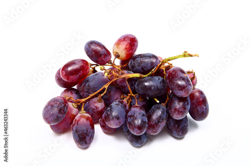 Obraz na plátně Bunch of juicy ripe black grapes isolated on a white background