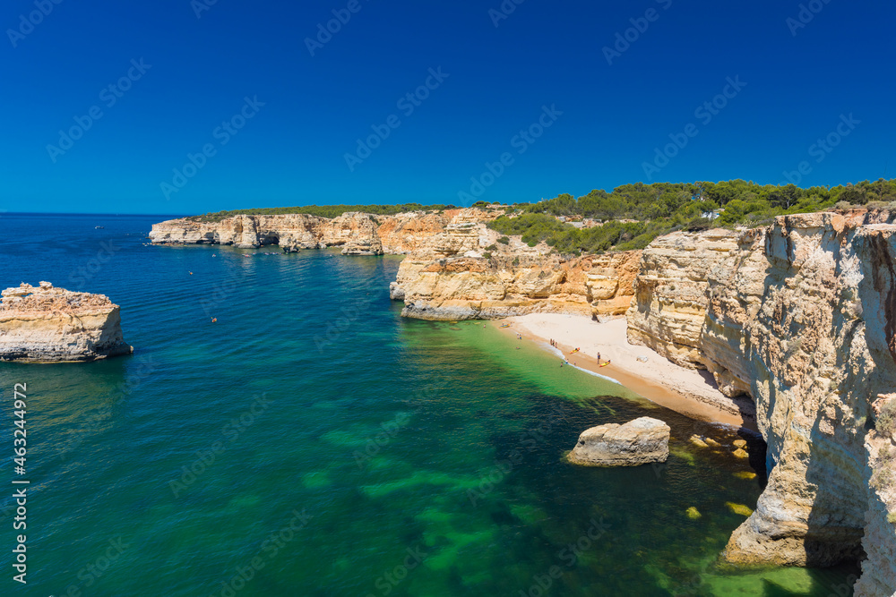 Obraz premium Aerial views of Praia da Marinha and Malhada do Baraco - beaches in Algarve, Portugal