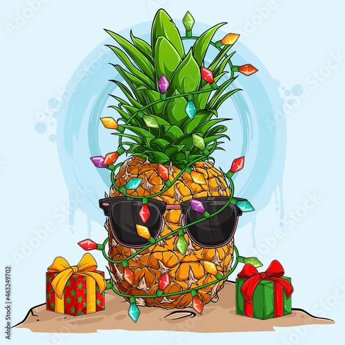 Funny Christmas Pineapple in sunglasses and surrounded by Christmas tree lights and gifts