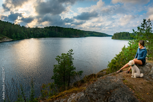 Tourist looks at Vansjo Lake Norway South East side