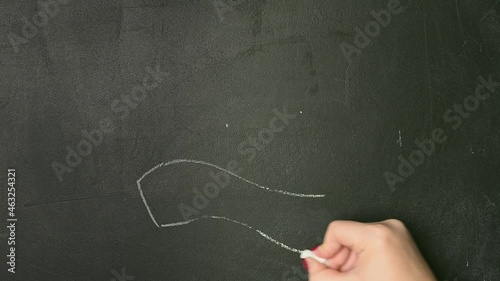 stockWoman drawing a vintage chalkboard illustration on blackboard. Holiday celebration concept. Art sketch style. Greeting card. Vintage style. Cartoon style. 2022 photo