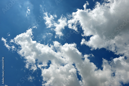White clouds in the blue summer sky 