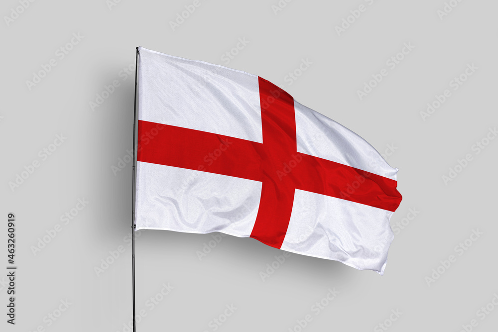 Obraz premium England flag isolated on the blue sky background. close up waving flag of England. flag symbols of England. Concept of England.