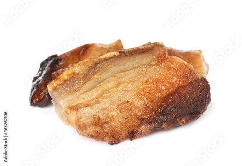 Tasty fried cracklings on white background. Cooked pork lard