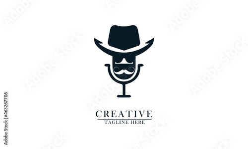 old cowboy hat, thick mustache glasses and podcast mic