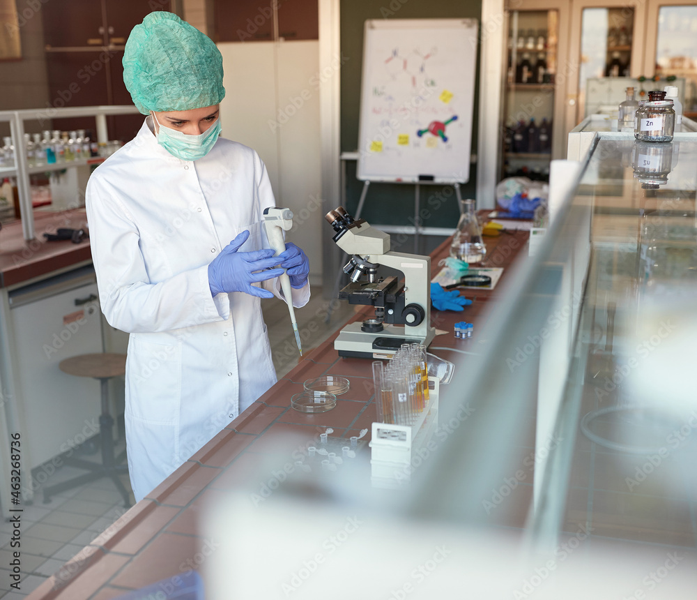 Lab worker working in laboratory. Lab worker working in laboratory.